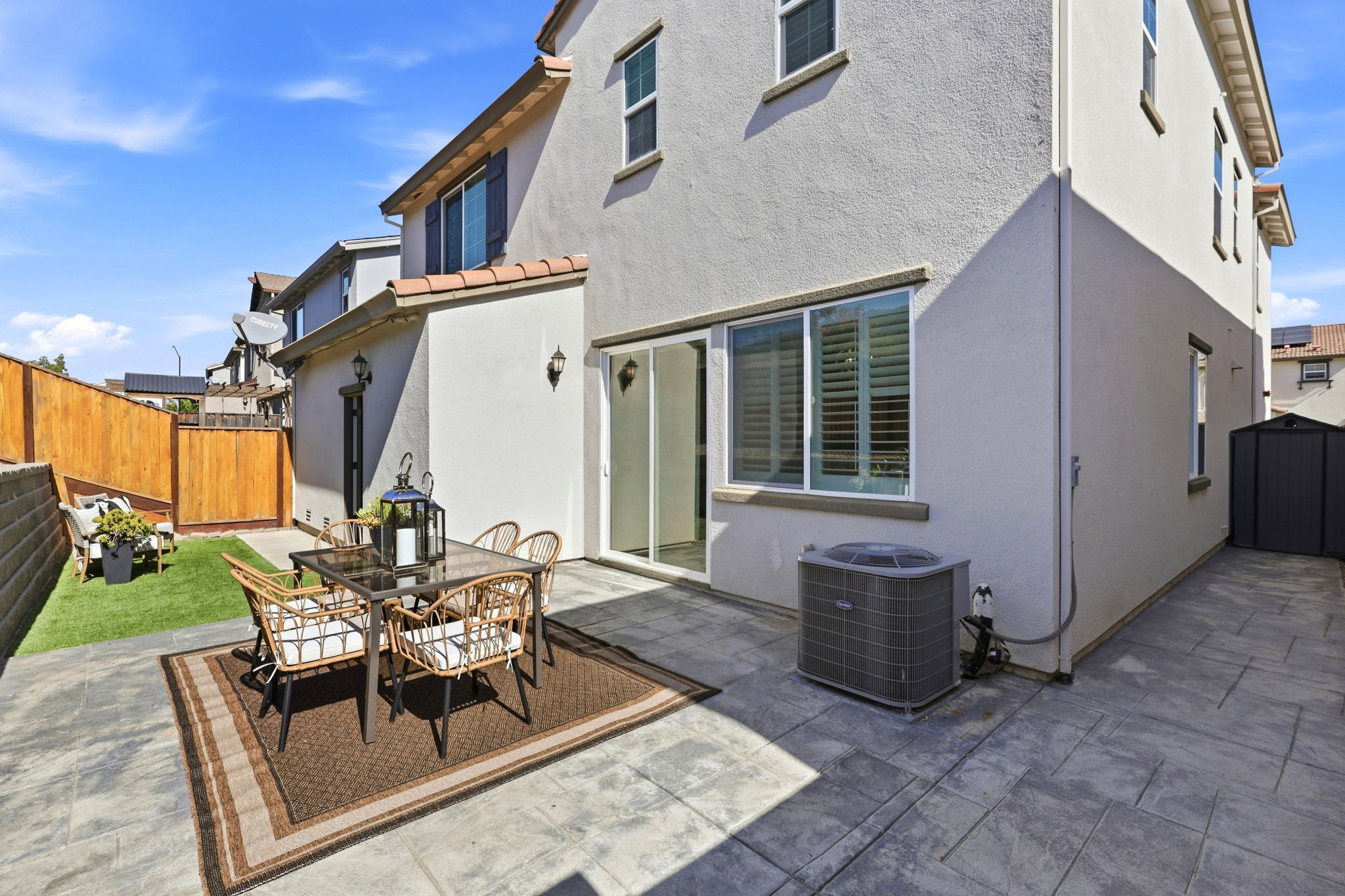 1230 Qualteri Way - Backyard patio with seating area and lawn